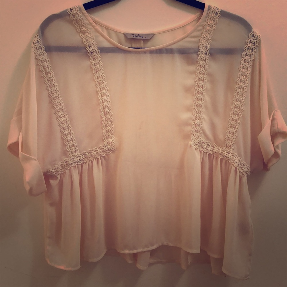 Cream, sheer slightly cropped top